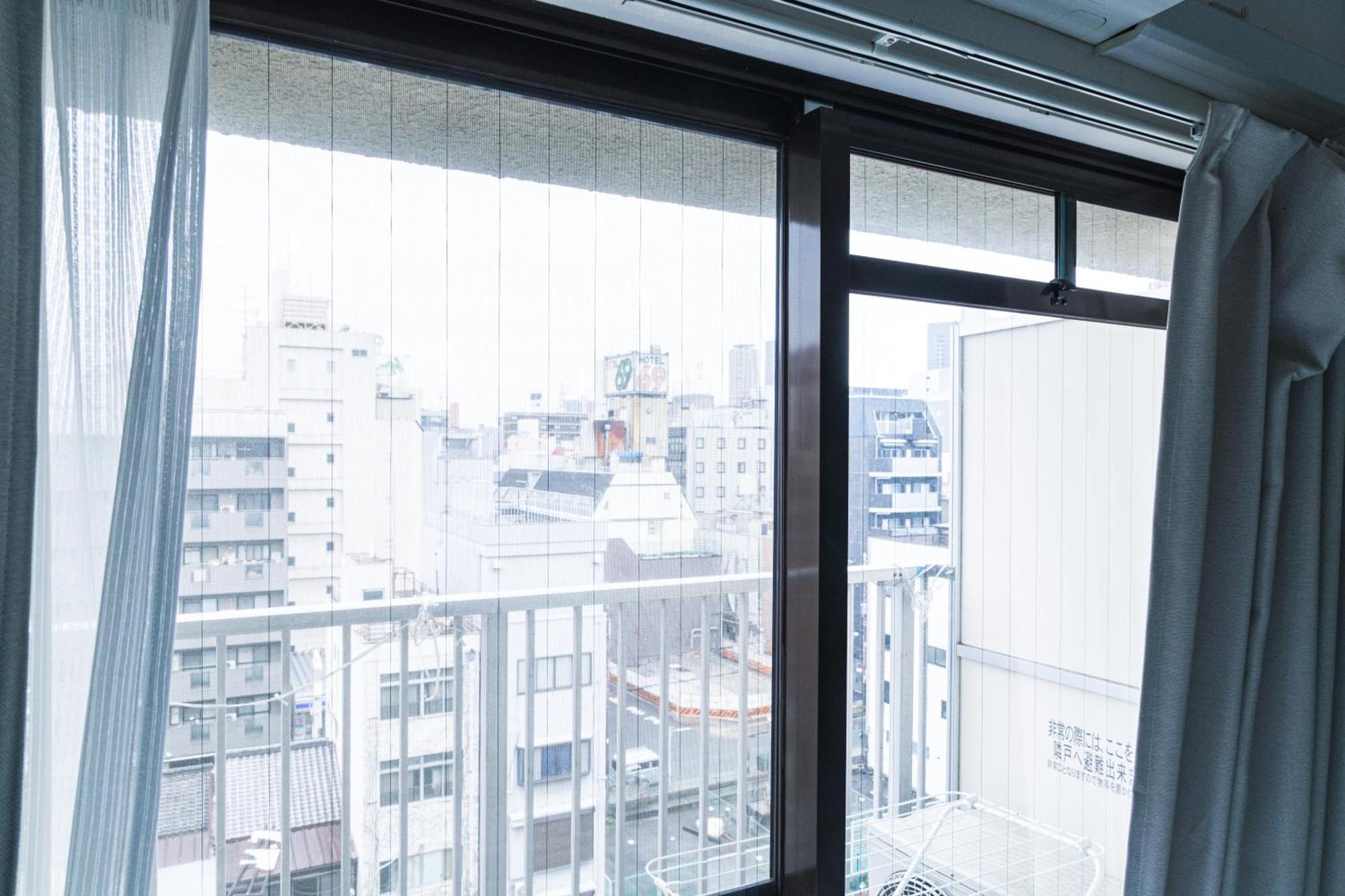 702 道頓堀側のお部屋 中心地へのアクセス抜群 ダブルベッド1台 お布団1枚 Appartement Osaka Buitenkant foto